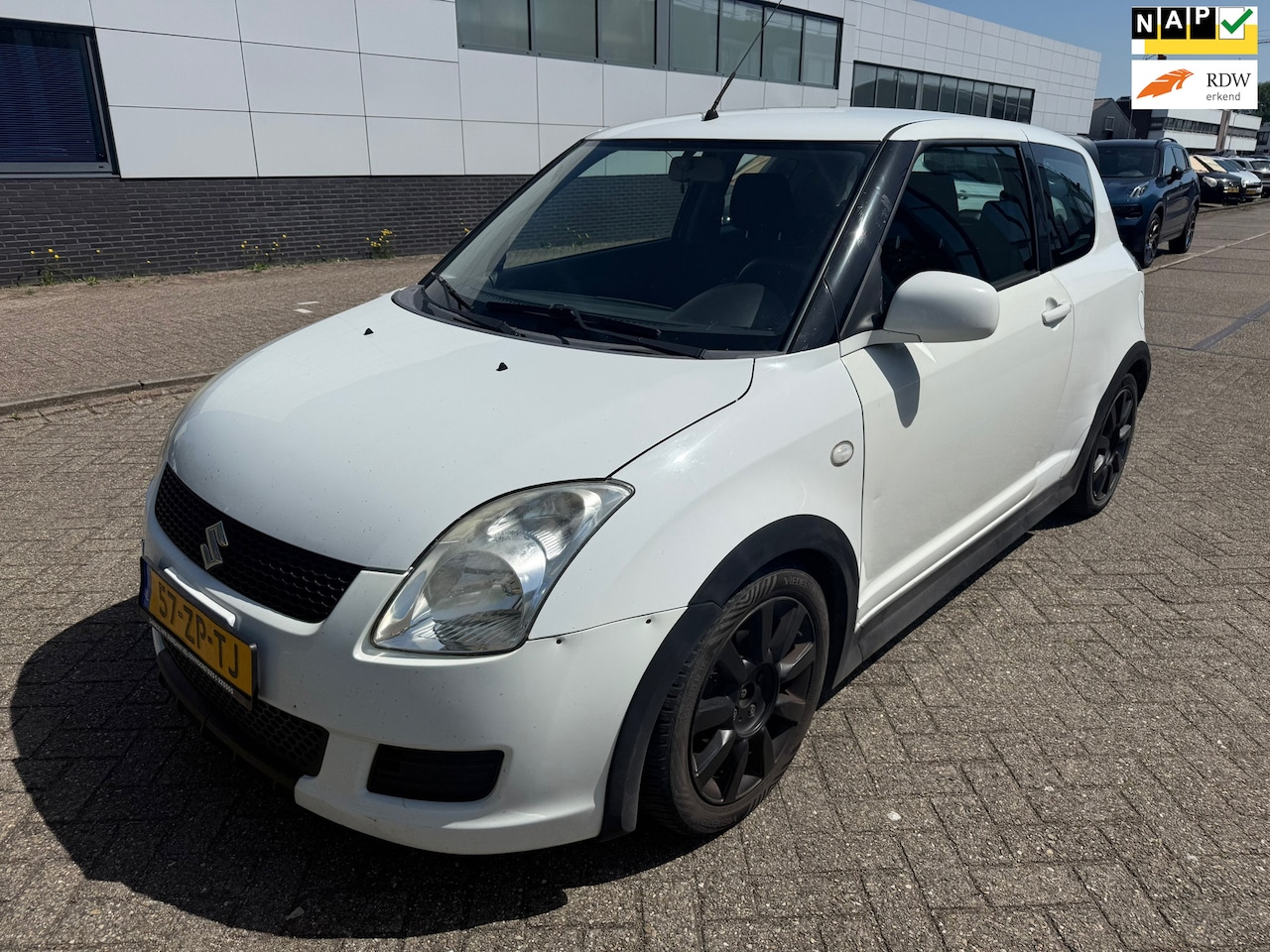 Suzuki Swift - 1.3 Comfort / APK / NAP / AIRCO / SCHERM / ALM VELGEN / INRUILAUTO / MEENEEM PRIJS!!! - AutoWereld.nl
