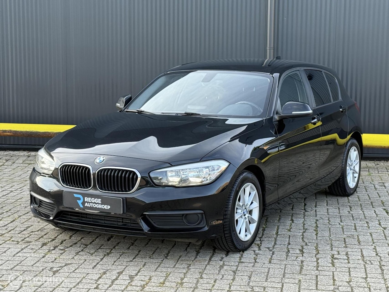 BMW 1-serie - 116i High Executive NAVI - AutoWereld.nl