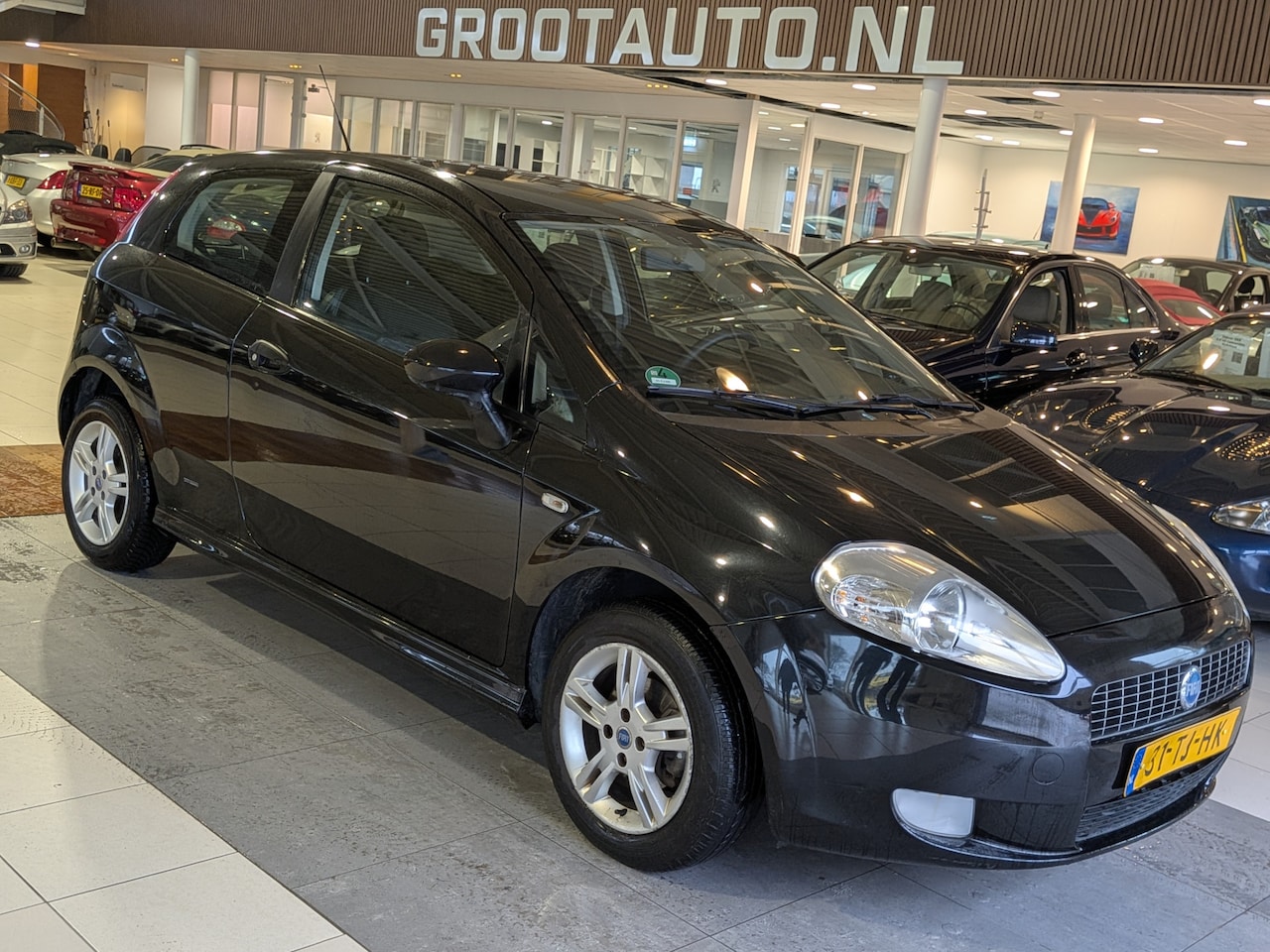 Fiat Grande Punto - 1.4 Edizione Prima Airco, Stuurbekrachtiging - AutoWereld.nl