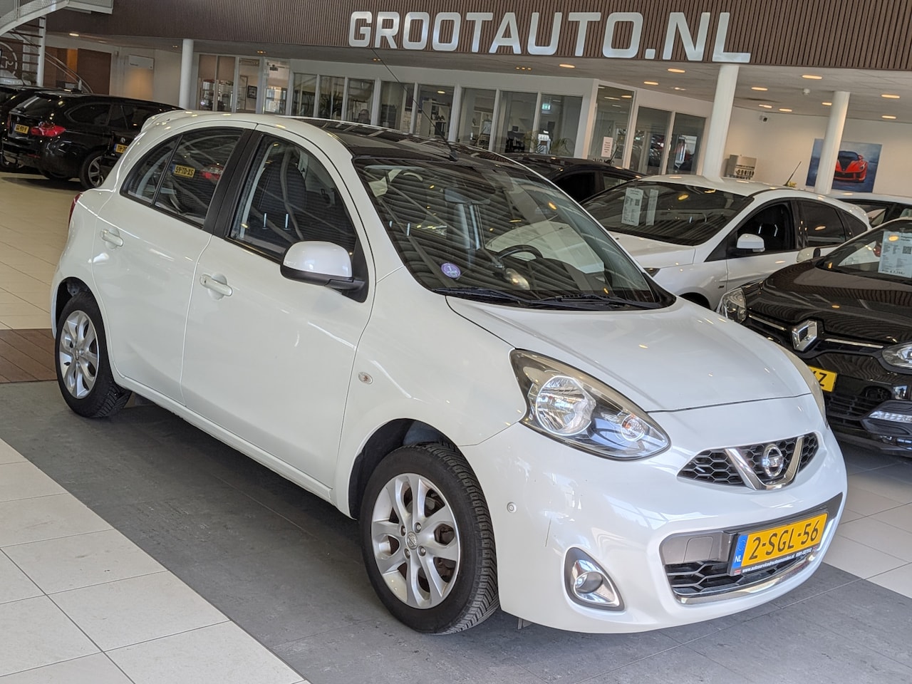 Nissan Micra - 1.2 DIG-S Tekna Panoramadak, Airco, Cruise Control, Stuurbekrachtiging - AutoWereld.nl
