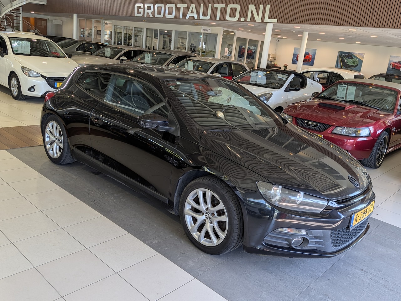 Volkswagen Scirocco - 1.4 TSI OPKNAPPER Airco, Cruise Control, Stuurbekrachtiging - AutoWereld.nl