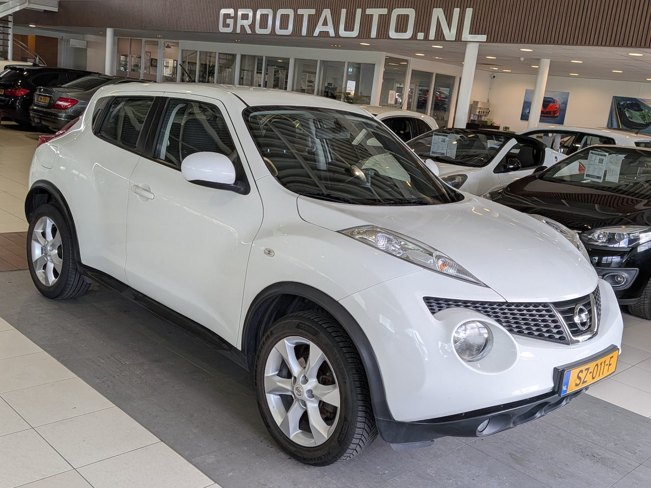 Nissan Juke - 1.6 Acenta Airco, Cruise Control, Trekhaak, Stuurbekrachtiging - AutoWereld.nl