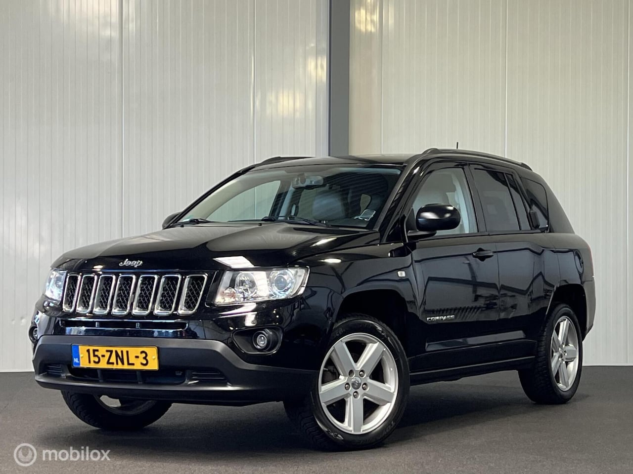 Jeep Compass - 2.0 Limited [ NAP leder navigatie cruise ] - AutoWereld.nl