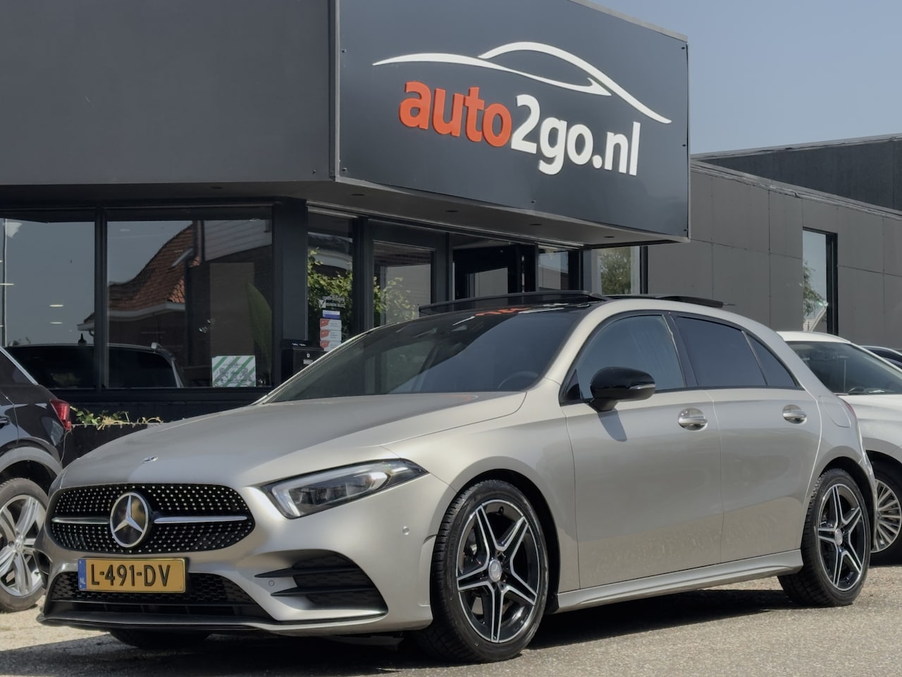 Mercedes-Benz A-klasse - 180 AUT7 AMG-LINE PANODAK LEDER NAVI CAMERA VIRTUAL-DASH APPLE-CARPLAY LED LMV PDC - AutoWereld.nl