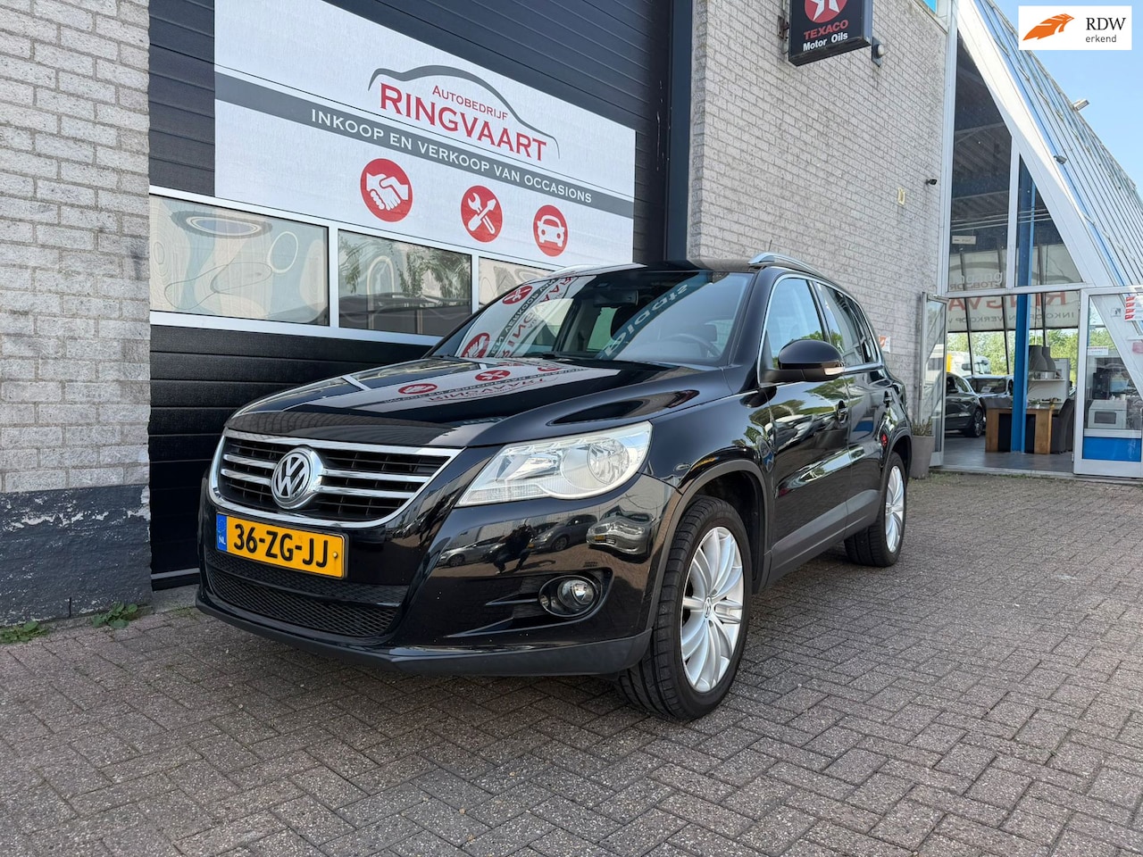 Volkswagen Tiguan - 1.4 TSI Sport&Style 4Motion Met Jaar Apk - AutoWereld.nl