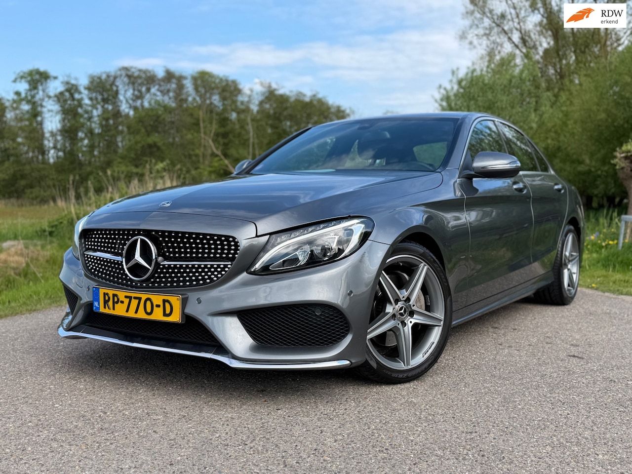 Mercedes-Benz C-klasse - 180 Business Solution AMG / NL Auto / Automaat / Clima / Navi / Camera / Sportstoelen / Le - AutoWereld.nl