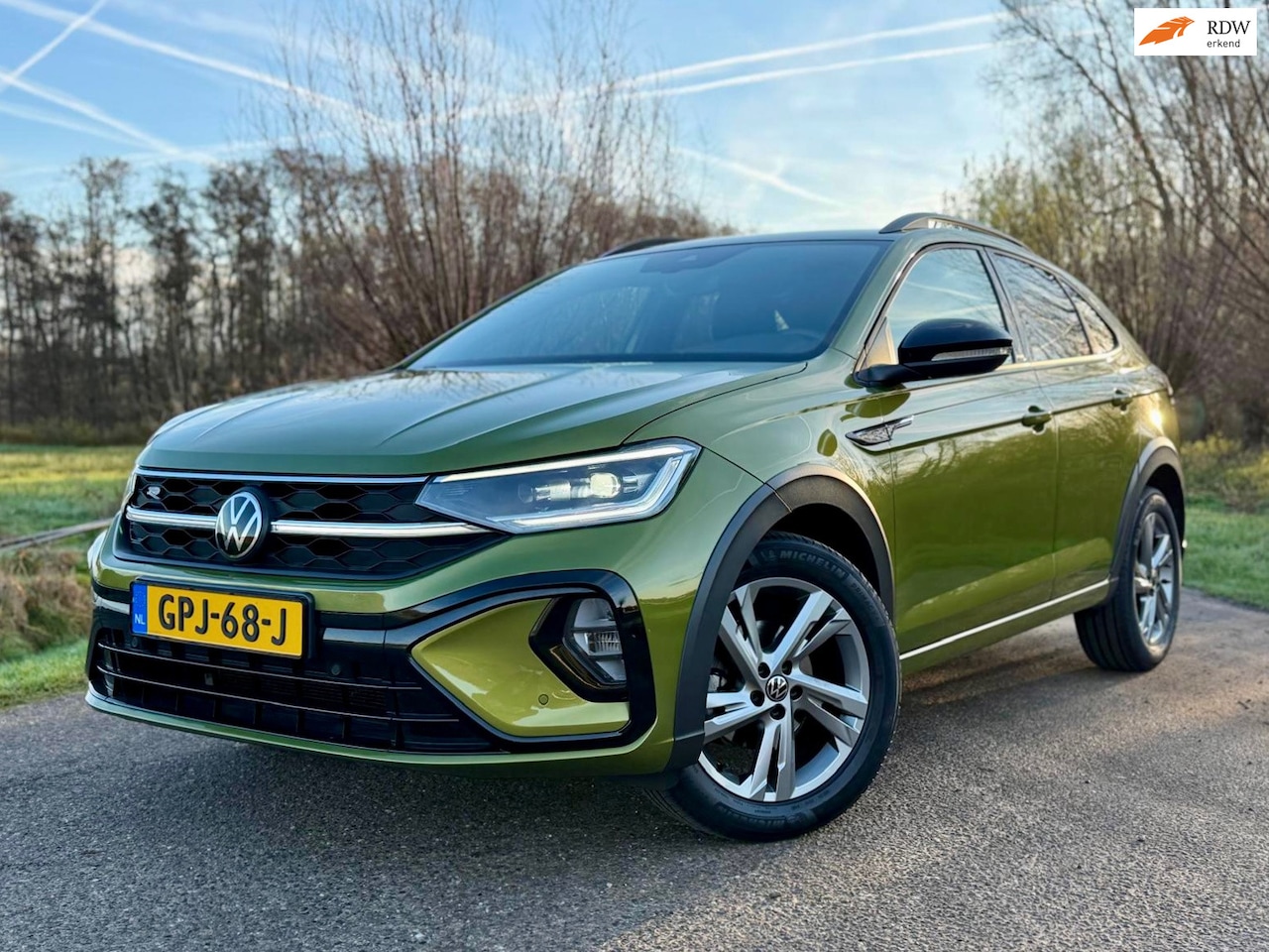 Volkswagen Taigo - 1.0 TSI R-Line Business IQ LED Automaat Clima Camera Virtueel Display Cruise Control - AutoWereld.nl