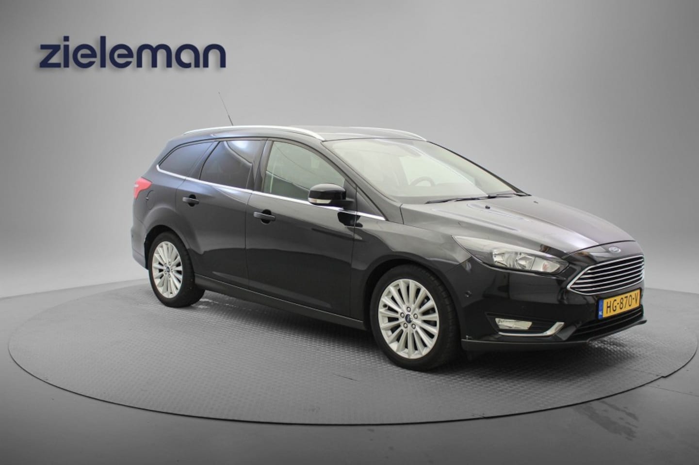 Ford Focus Wagon - 1.0 Titanium - Navi, Cruise, Clima, PDC - AutoWereld.nl