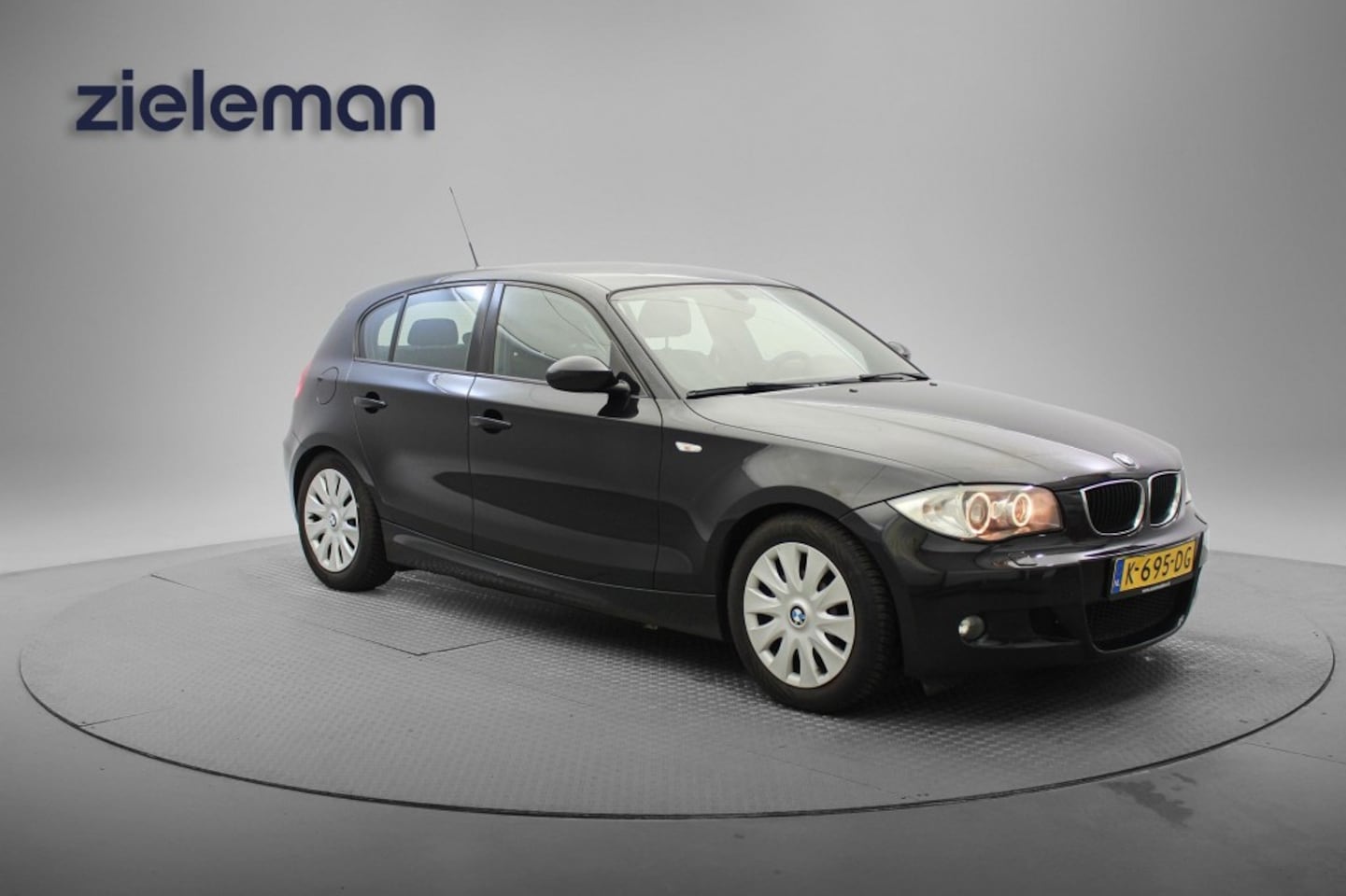 BMW 1-serie - 116i - Airco, Half Leer, Stoelverwarming, Sportstuur - AutoWereld.nl