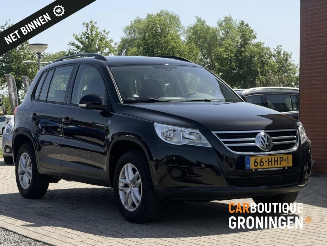 Volkswagen Tiguan - 1.4 TSI Comfort&Design | CRUISE | TREKHAAK - AutoWereld.nl