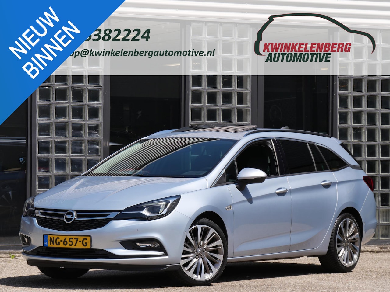 Opel Astra Sports Tourer - ST 1.4T INNOVATION/ SCHUIFDAK/ TREKHAAK/ BLIS/ CAMERA/ PDC V+A/ ALL-SEASON - AutoWereld.nl