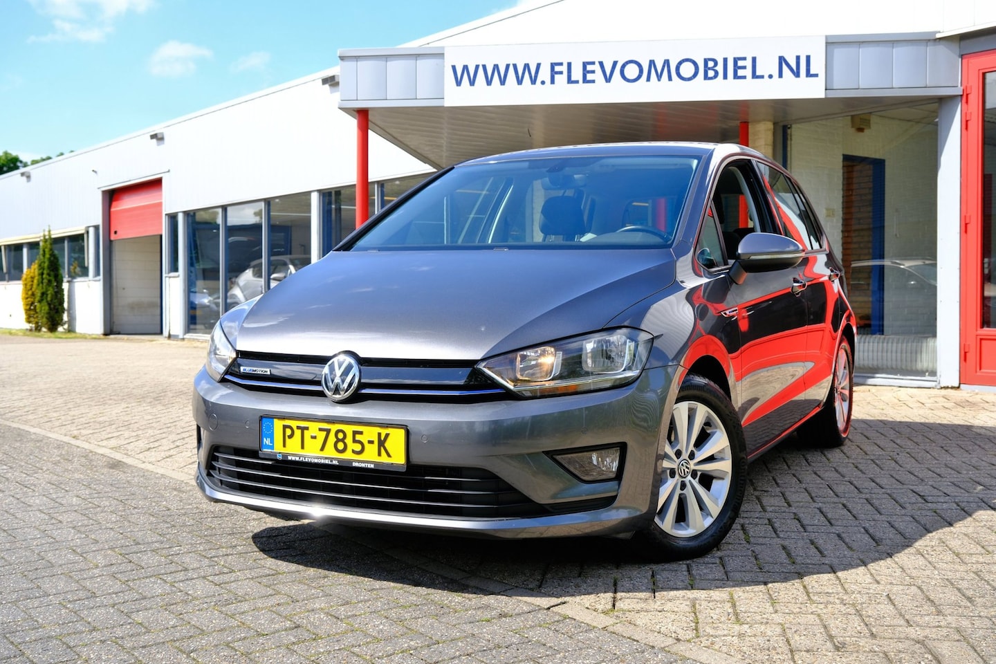 Volkswagen Golf Sportsvan - 1.0 TSI Comfortline Aut. *56.664km!* Navi|1e Eig|Clima|LMV|CarPlay|PDC - AutoWereld.nl