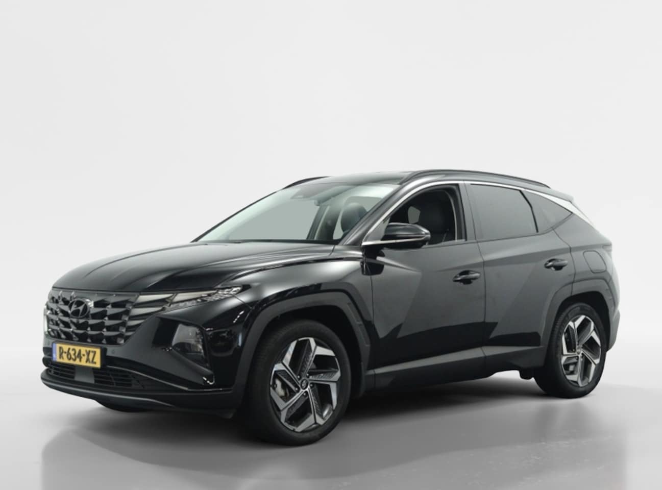 Hyundai Tucson - 1.6 T-GDI PHEV Premium | Leder | Navi | Apple carplay | Stoelven - AutoWereld.nl