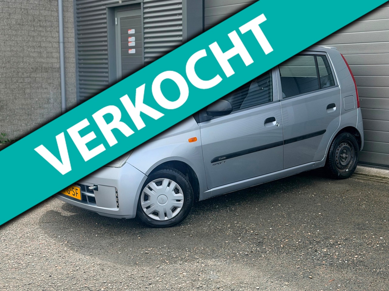 Daihatsu Cuore - 1.0-12V Automaat - AutoWereld.nl