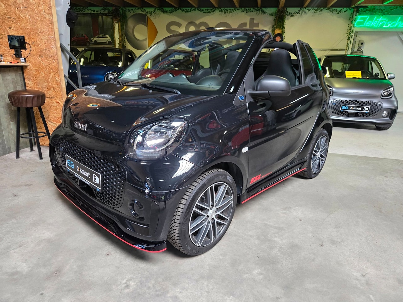 Smart Fortwo cabrio - EQ 22 kWh snellader - Brabus 16 inch - spoilers/skirts - ESL edition - licht- en regensens - AutoWereld.nl