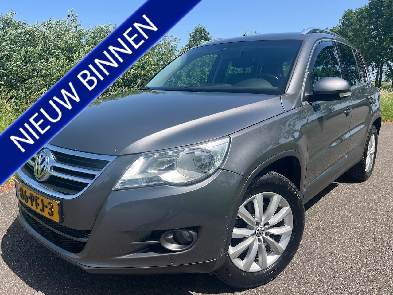 Volkswagen Tiguan - 1.4 TSI Sport&Style - AutoWereld.nl