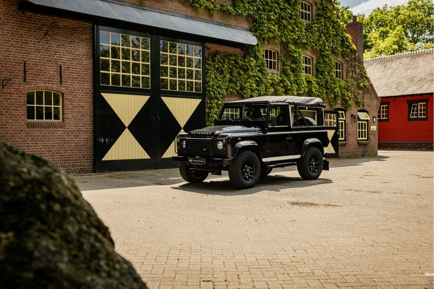 Land Rover Defender - 2.2Tdci Soft Top 25.000km - AutoWereld.nl