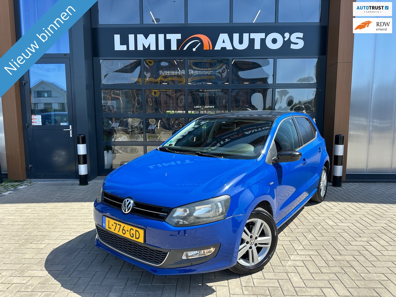 Volkswagen Polo - 1.2 Easyline Airco/Navi/Pdc/Cruise/St.verwarming/El.ramen/Lmv/Apk - AutoWereld.nl