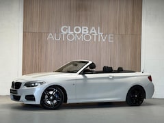 BMW 2-serie Cabrio - M235i - AUTOMAAT - PARELMOER WIT - LEER - NAVIGATIE - HARMAN KARDON - M PERFORMANCE UITLAA