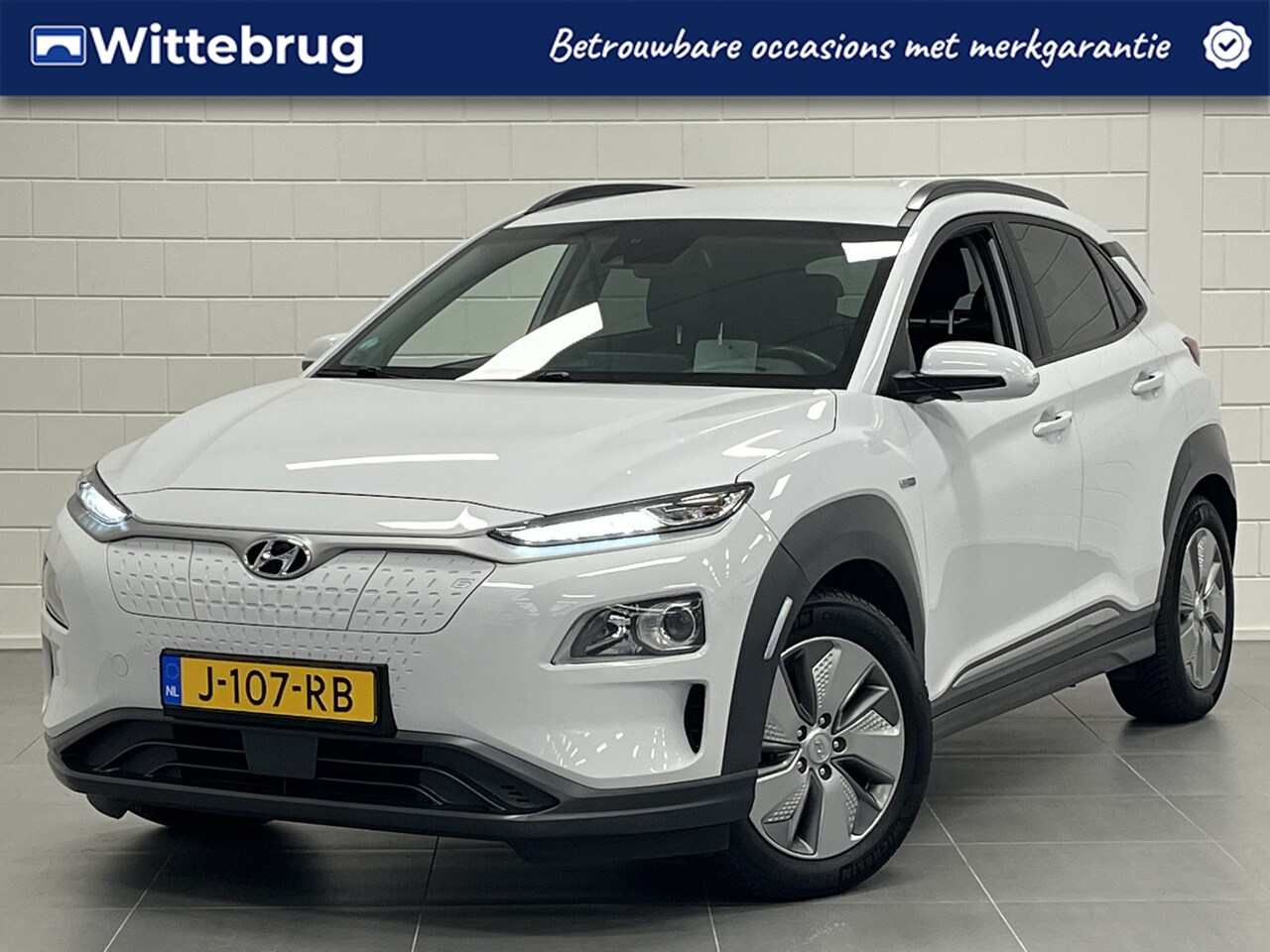 Hyundai Kona Electric - EV Fashion Design 64 kWh TREKHAAK | LONG RANGE | ALL SEASON BANDEN | NAVIGATIE | STOELVERW - AutoWereld.nl