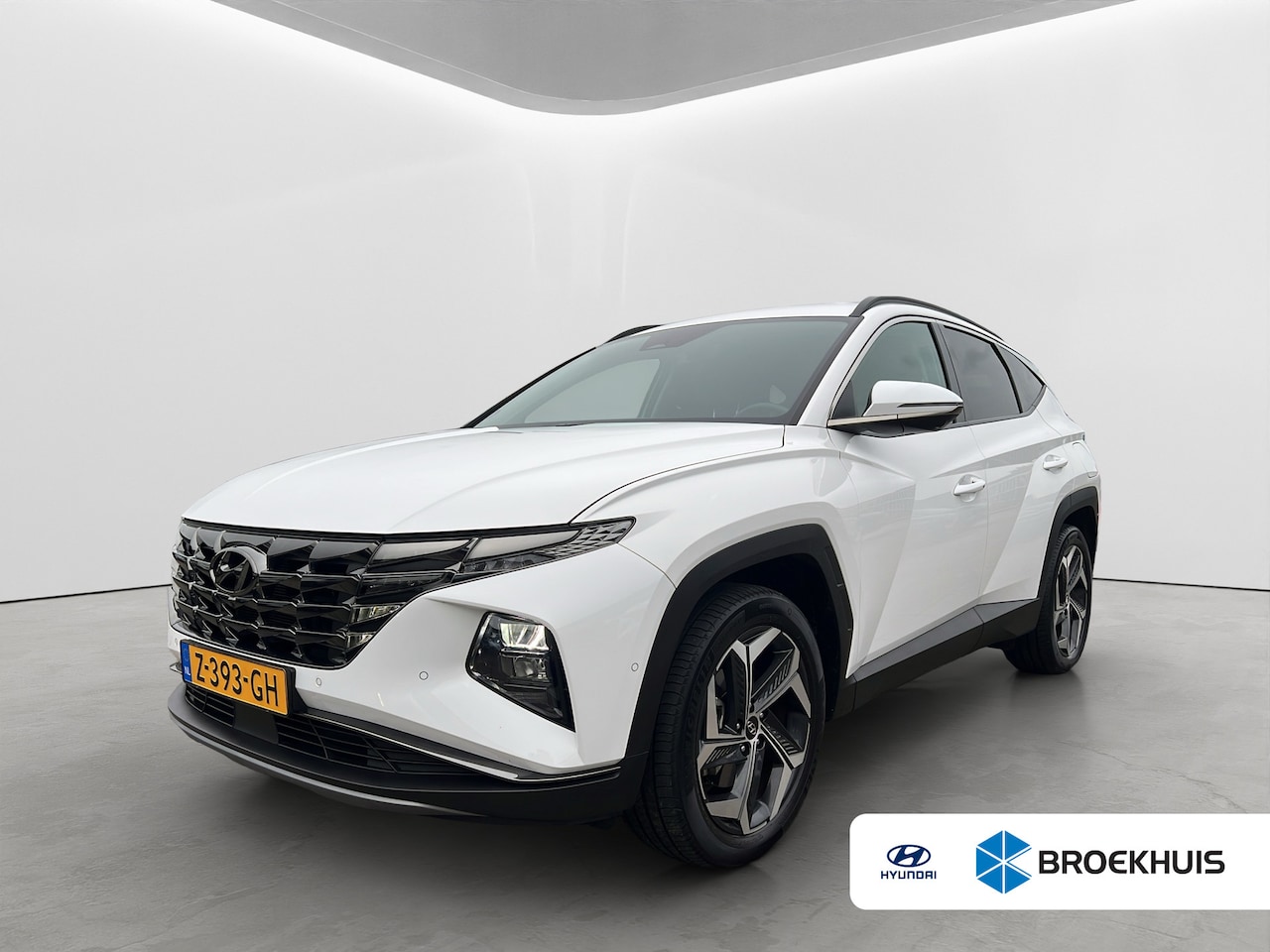 Hyundai Tucson - 1.6 T-GDI 265pk PHEV Premium 4WD | Leder | Carplay | Climate | Keyless | Navigatie | Elek. - AutoWereld.nl