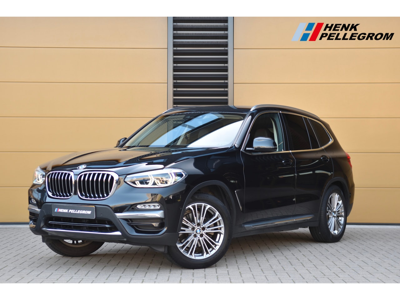 BMW X3 - xDrive20i High Executive * Sportstoelen * Stuurverwarming * Trekhaak * Privacy glass * - AutoWereld.nl