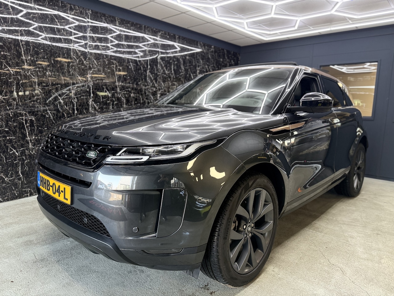 Land Rover Range Rover Evoque - 1.5 P300e AWD R-Dynamic HSE PANO - AutoWereld.nl