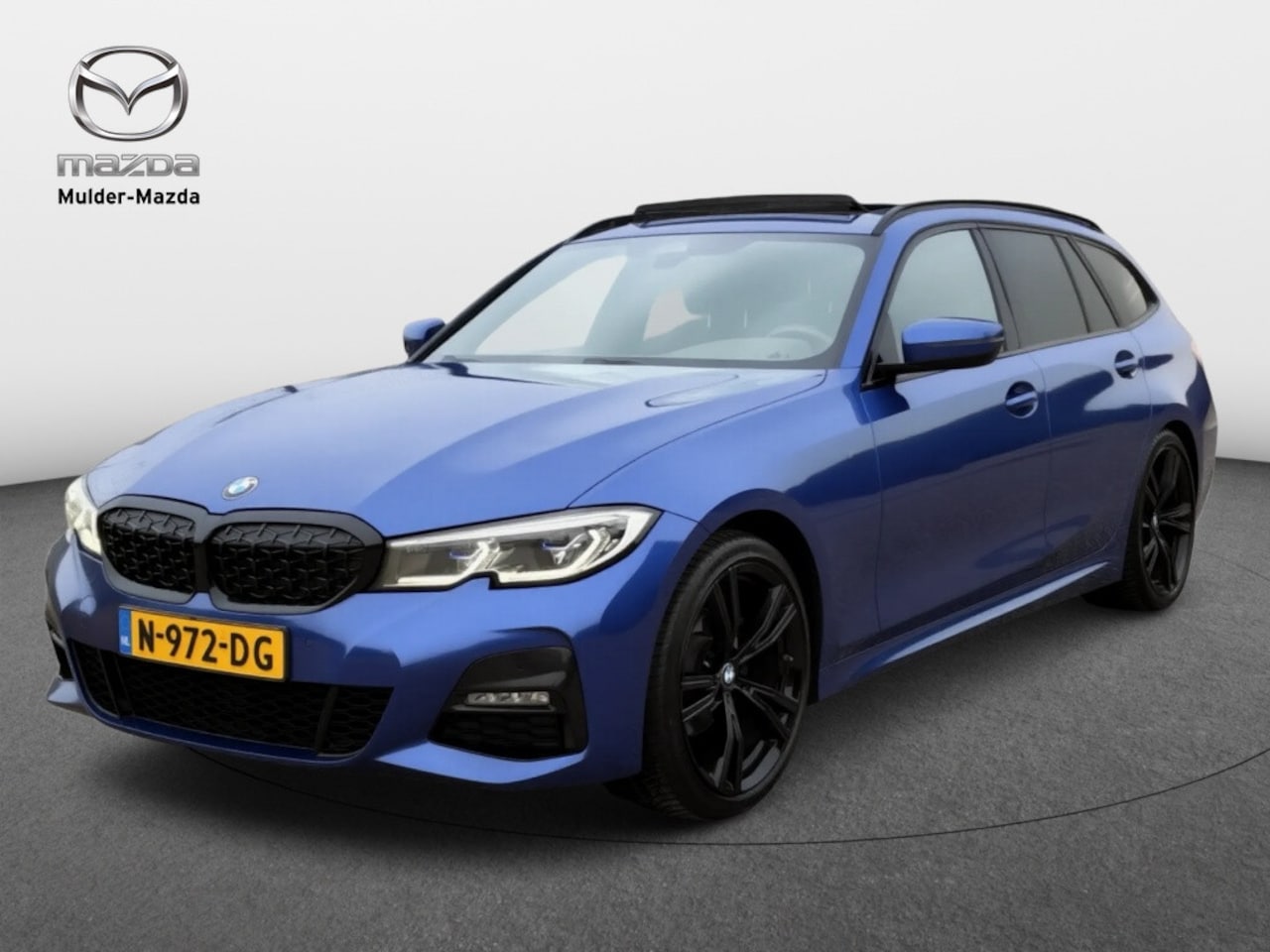 BMW 3-serie Touring - 318i Executive Edition M-pakket Aut | Leder | Panoramadak - AutoWereld.nl