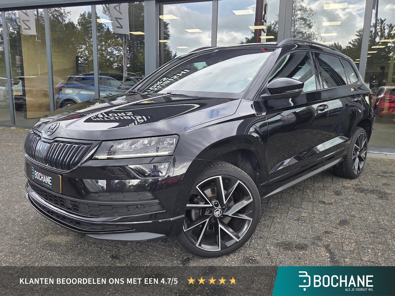 Skoda Karoq - 1.5 TSI ACT Sportline Business | Panoramadak | AppleCarplay/AndroidAuto | Automaat | - AutoWereld.nl