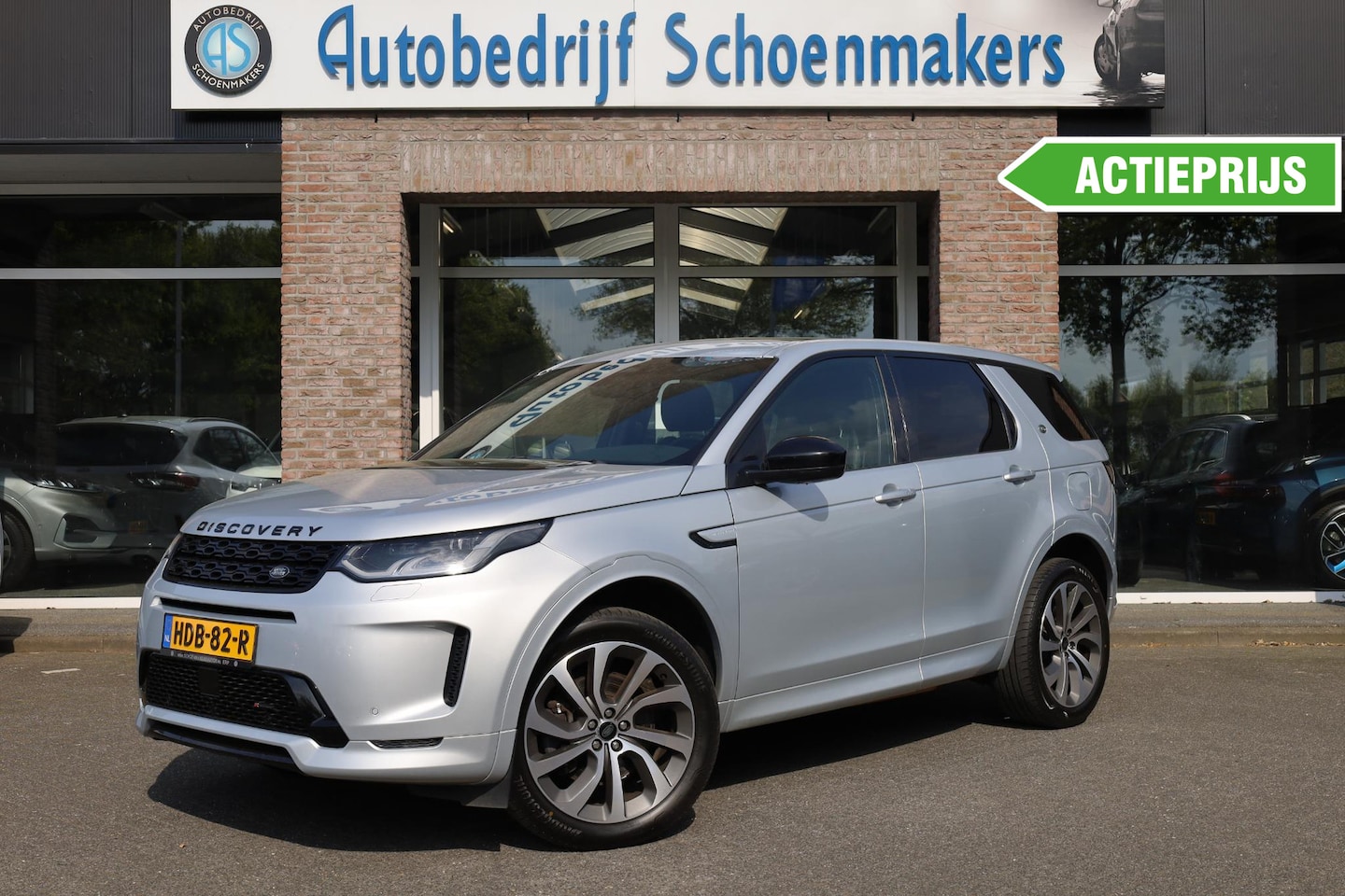 Land Rover Discovery Sport - P300e 1.5 R-Dynamic PANO WINDSOR-LEER MEMORY ELEK.TREKHAAK 20"LMV CAMERA RUITVERWARMING ME - AutoWereld.nl