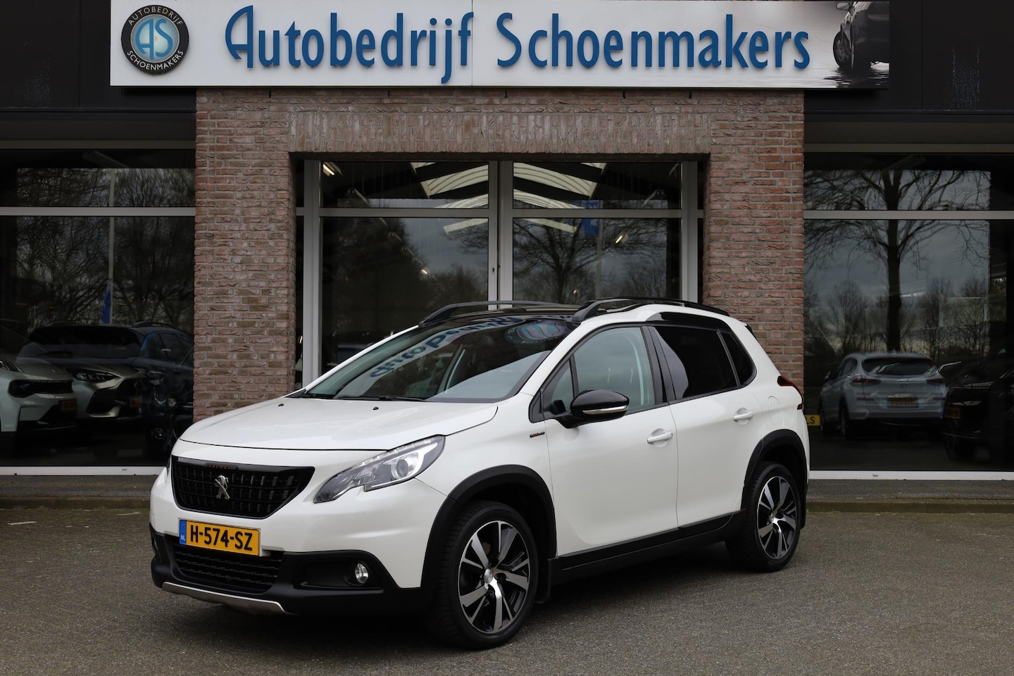 Peugeot 2008 - 1.2 PureTech GT-Line TREKHAAK HALF-LEER CARPLAY DAB CAMERA CRUISE CLIMA NAVI PDC 17''LMV - AutoWereld.nl