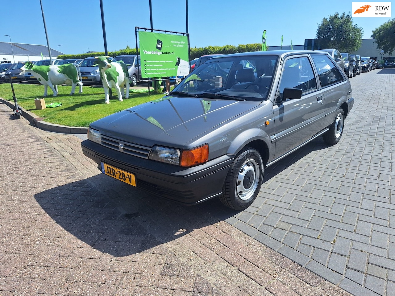 Nissan Sunny - 1.3 L / AUTOMAAT / Uitzonderlijk netjes / NIEUWE APK - AutoWereld.nl