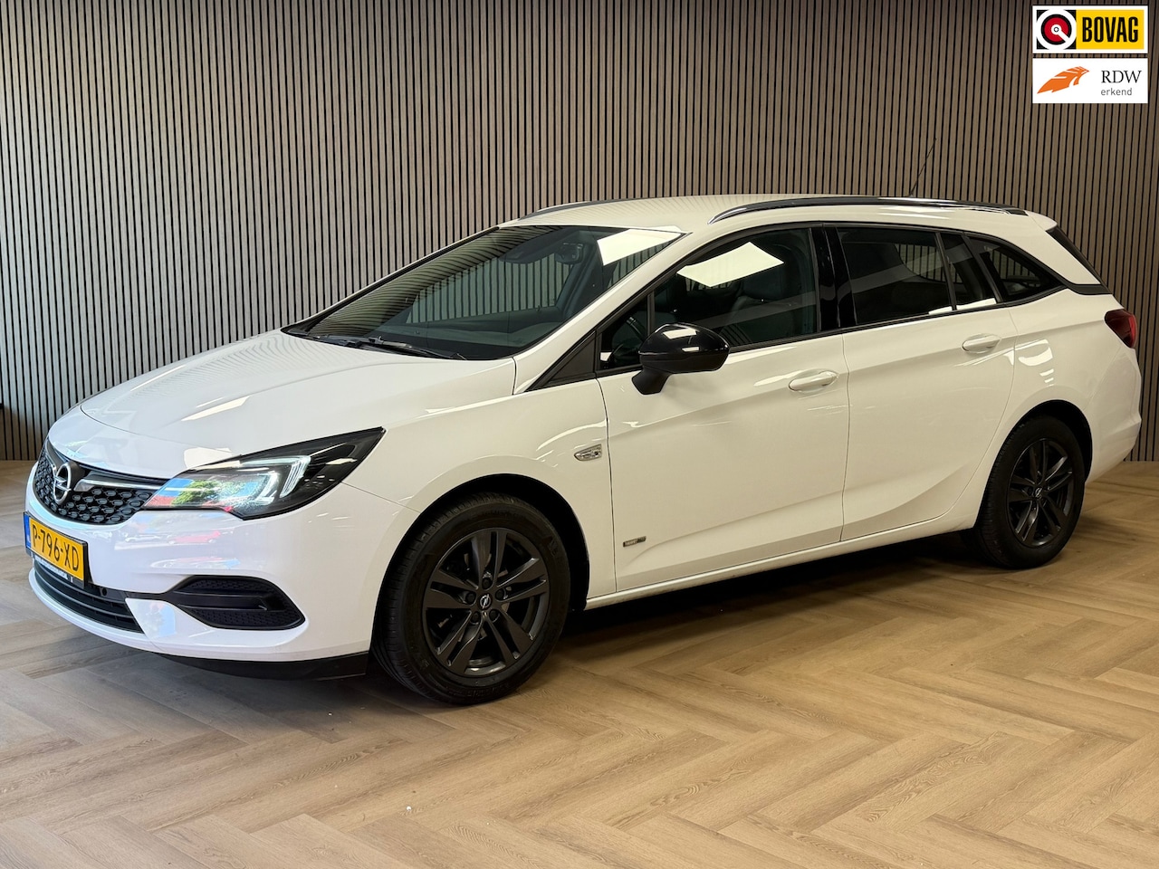 Opel Astra Sports Tourer - 1.2 Design & Tech AIRCO APPLE CARPLAY PDC START/STOP CRUISE - AutoWereld.nl