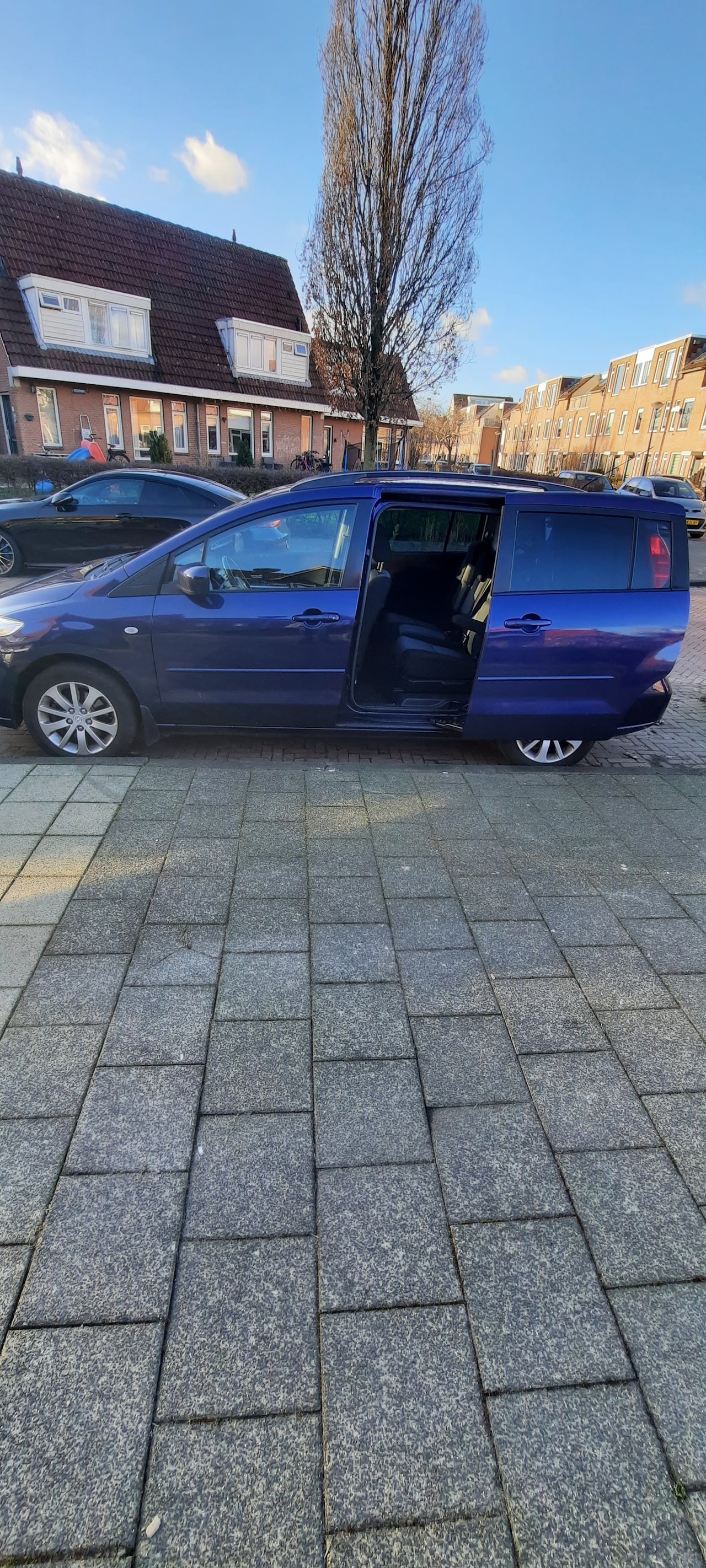 Mazda 5 - 2.0 Touring 7 zitter met schuifdeuren - AutoWereld.nl