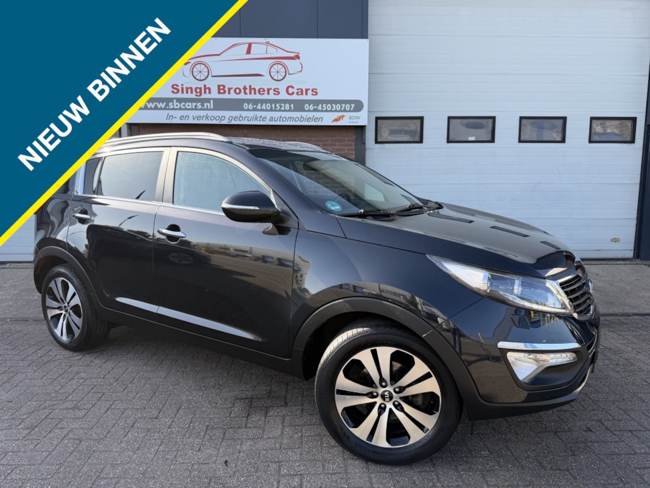 Kia Sportage - 2.0 X-clusive First/AUT/LEER/NAVI/NAP/INRUIL MOG!!! - AutoWereld.nl