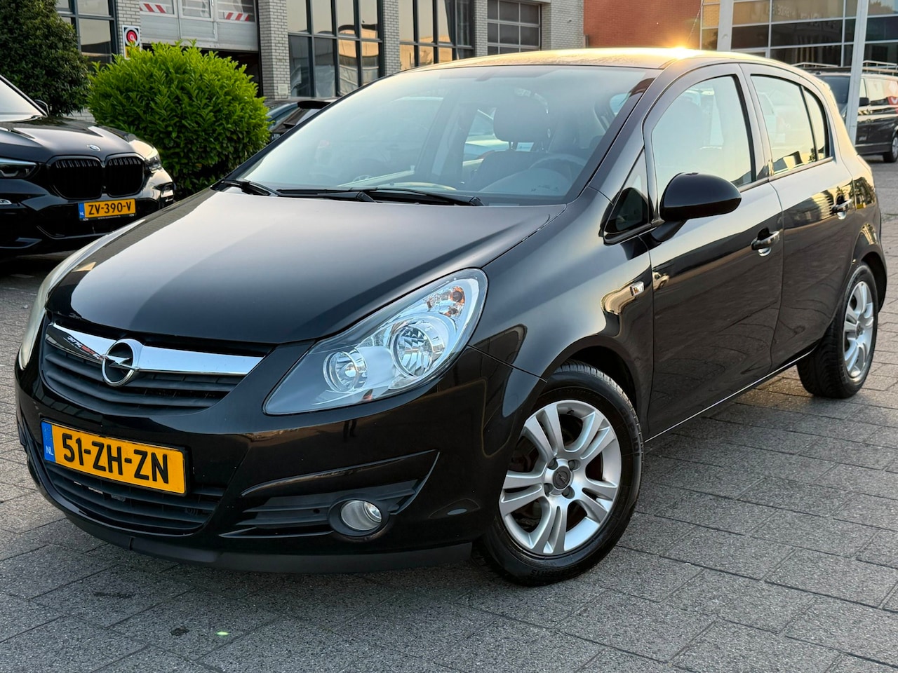 Opel Corsa - 1.4-16V Enjoy l Cruise control l Airco - AutoWereld.nl