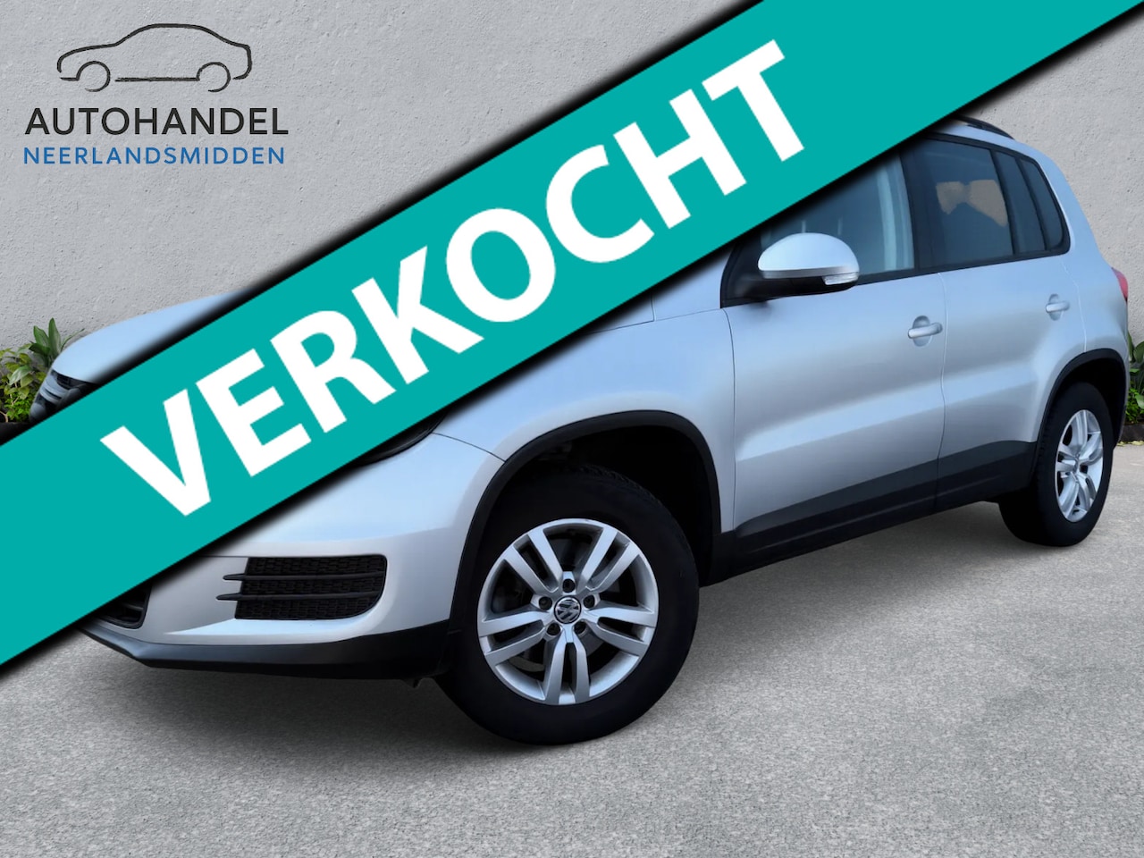 Volkswagen Tiguan - 1.4 TSI panoramadak airco trekhaak camera - AutoWereld.nl