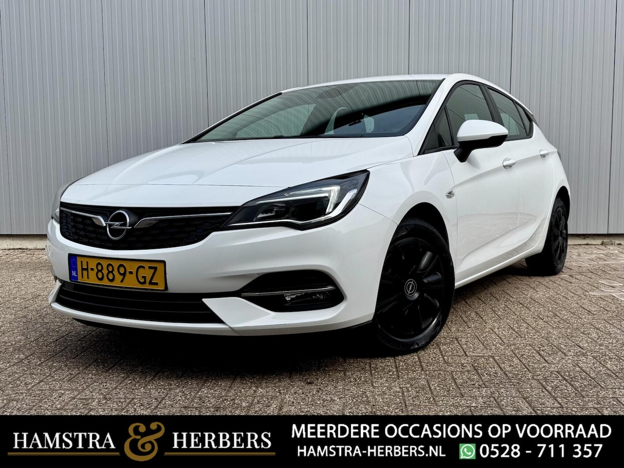 Opel Astra - 1.2 Business Edition wit - AutoWereld.nl