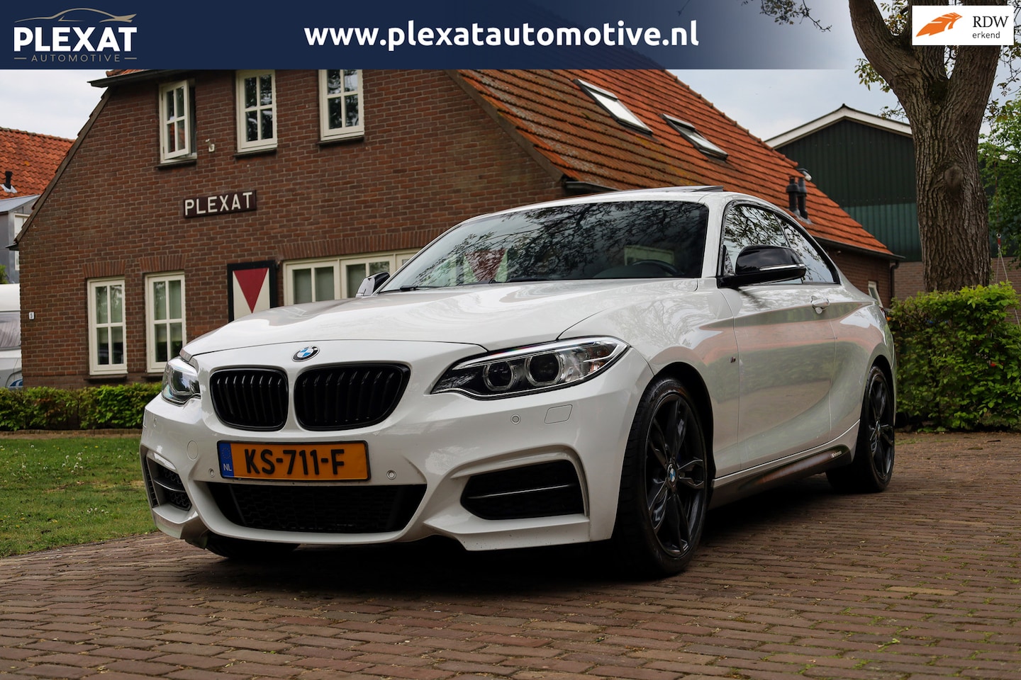 BMW 2-serie Coupé - M235i High Executive | M-pakket | Panorama | HANGESCHAKELD | H&K | Apple Carplay | Stoelve - AutoWereld.nl