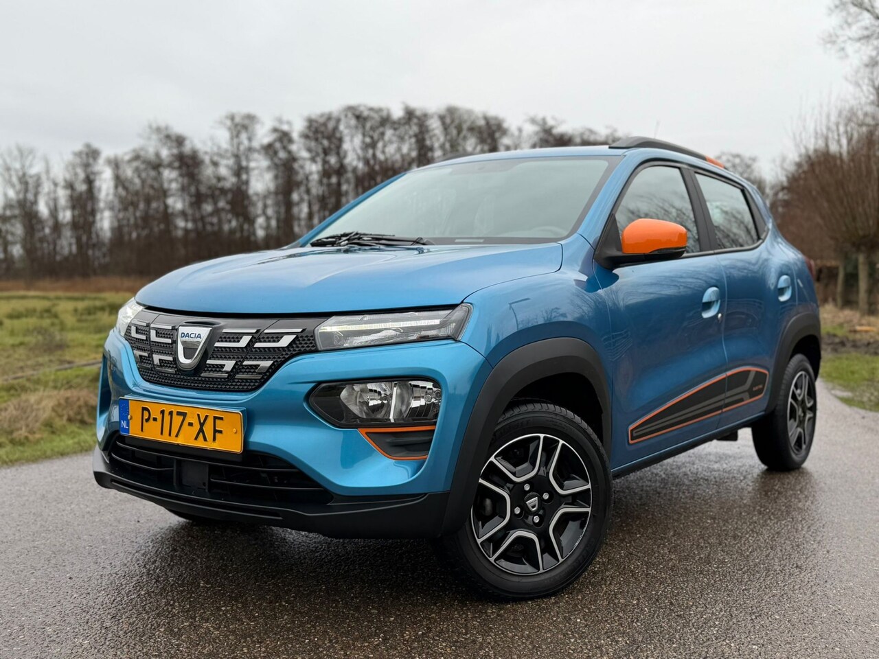 Dacia Spring - Comfort Plus 27 kWh / Full Electric / Automaat / Airco / Navi / Leder / Camera / Cruise Co - AutoWereld.nl