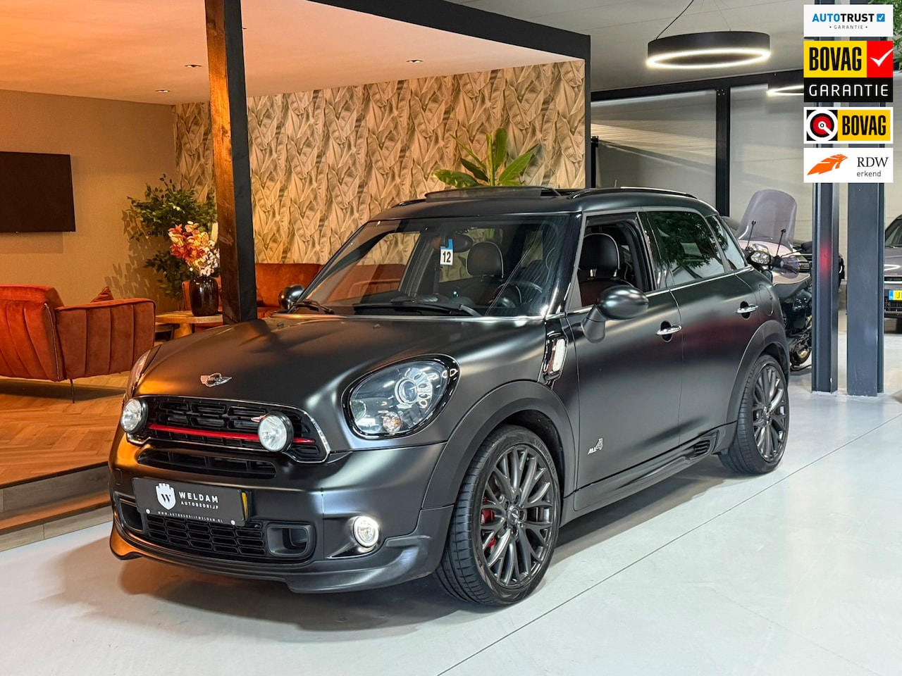 MINI Countryman - Mini 1.6 John Cooper Works ALL4 Chili | Pano | Leder | Harman Kardon | Xenon | Automaat | - AutoWereld.nl