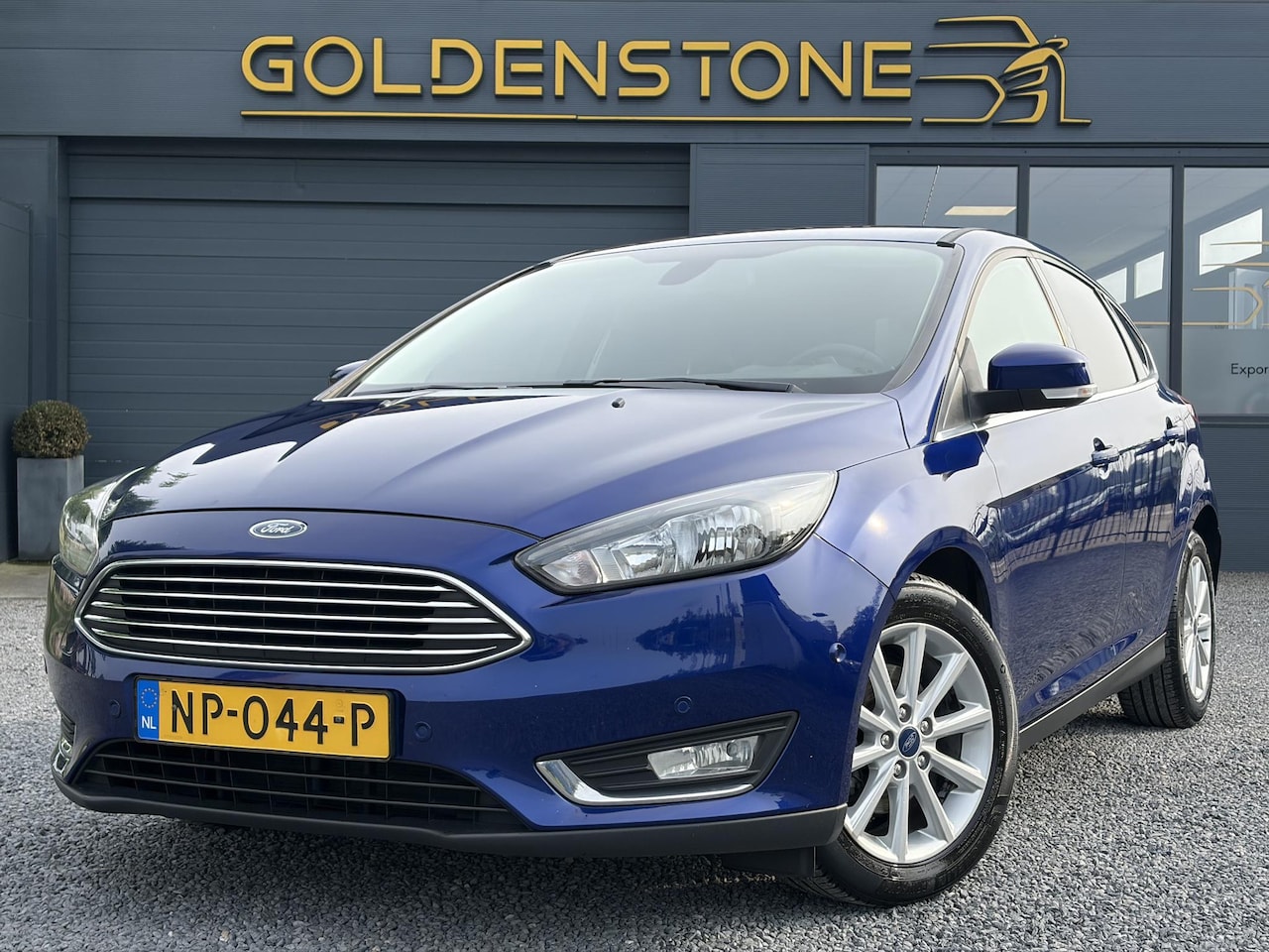 Ford Focus - 1.0 Titanium 2e Eigenaar,Dealer Onderhouden,Navi,Pdc V+A,125pk,Clima,Cruise,6 Bak,Lm velge - AutoWereld.nl