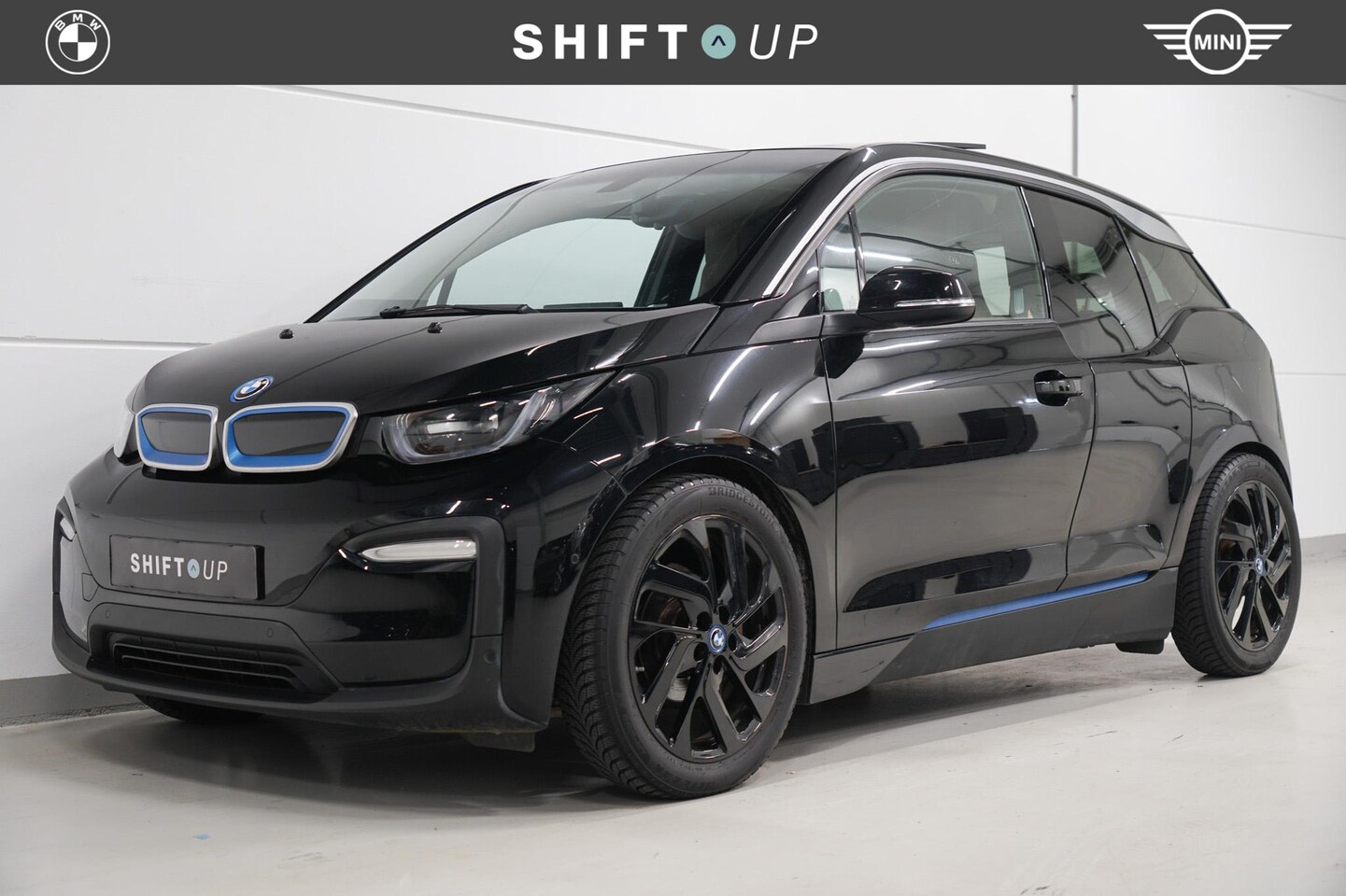 BMW i3 - 94Ah 33 kWh Schuifdak | Harman Kardon | Camera - AutoWereld.nl
