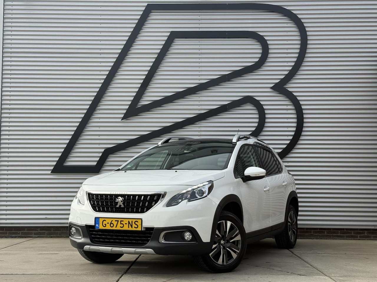 Peugeot 2008 - 1.2 PureTech Allure 2e Eigenaar|Navi|Pano|Camera|Clima|Cruise|PDC|N.A.P|APK tot 10-2027 - AutoWereld.nl
