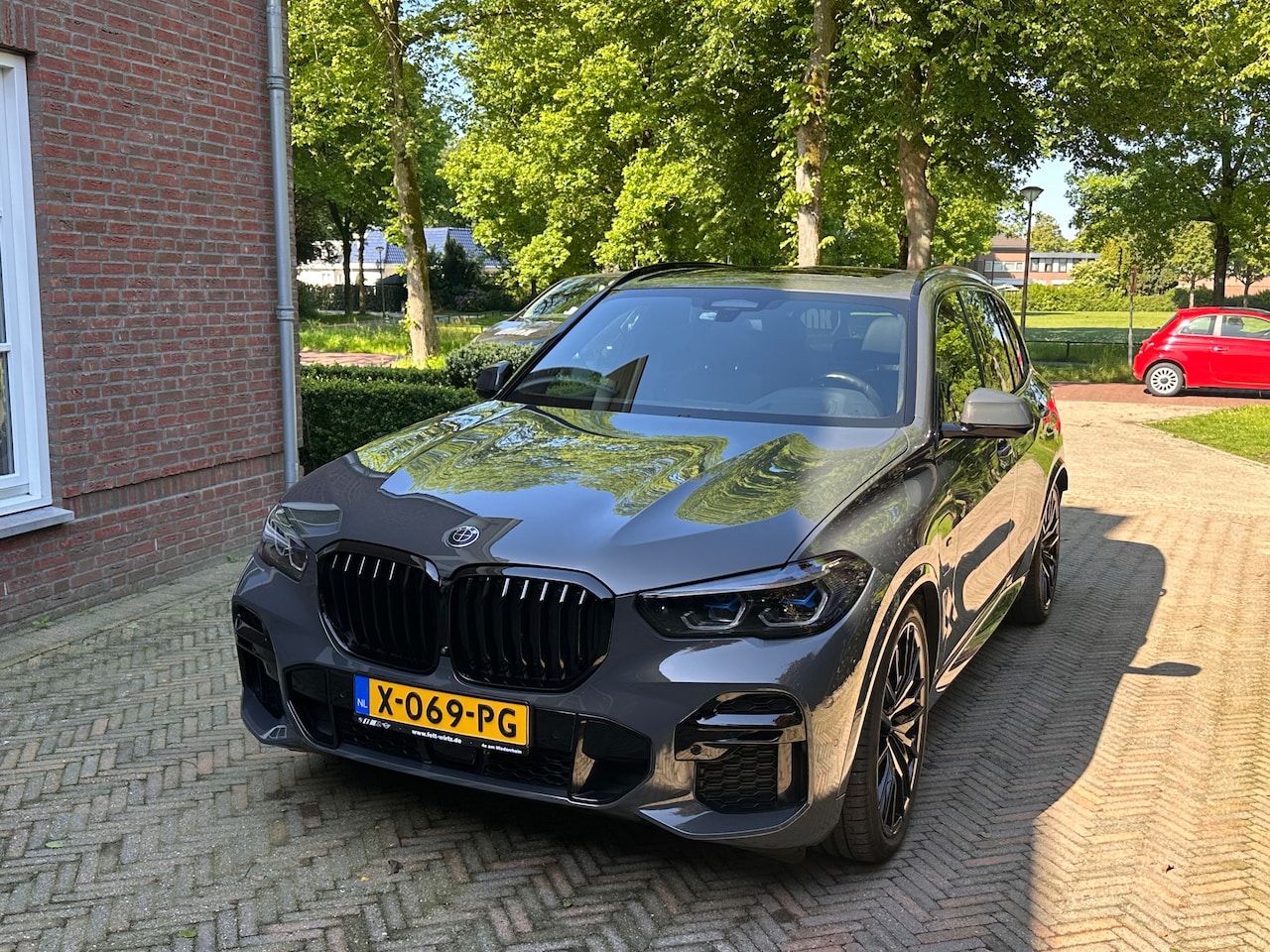 BMW X5 - 45e xDrive High Executive BMW Individual Dravitgrau metallic BMW Individual erweiterte Lederausstattung "Merino"S01C - AutoWereld.nl