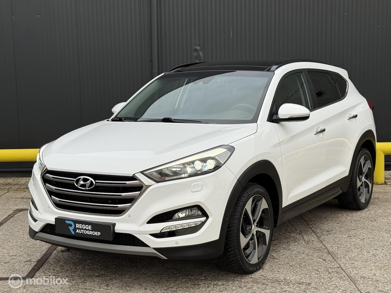 Hyundai Tucson - 1.6 T-GDi Premium 4WD PANORAMADAK | BOMVOL - AutoWereld.nl