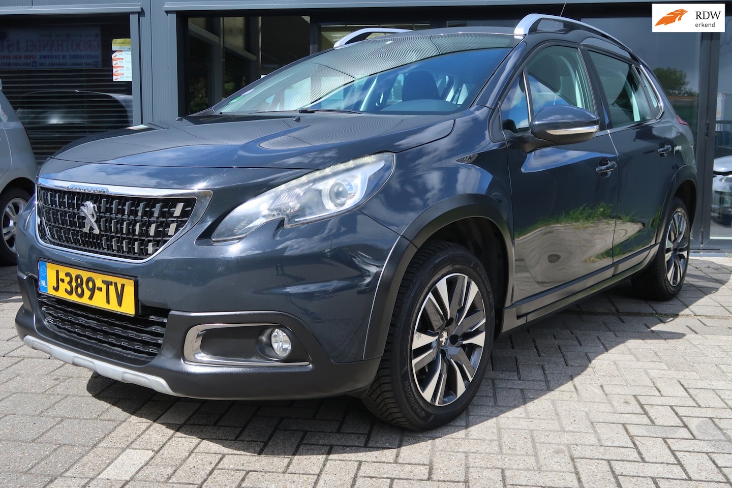Peugeot 2008 - 1.2 PureTech Allure *Rijklaarprijs *Dealerondehouden *Nieuwe koppeling - AutoWereld.nl