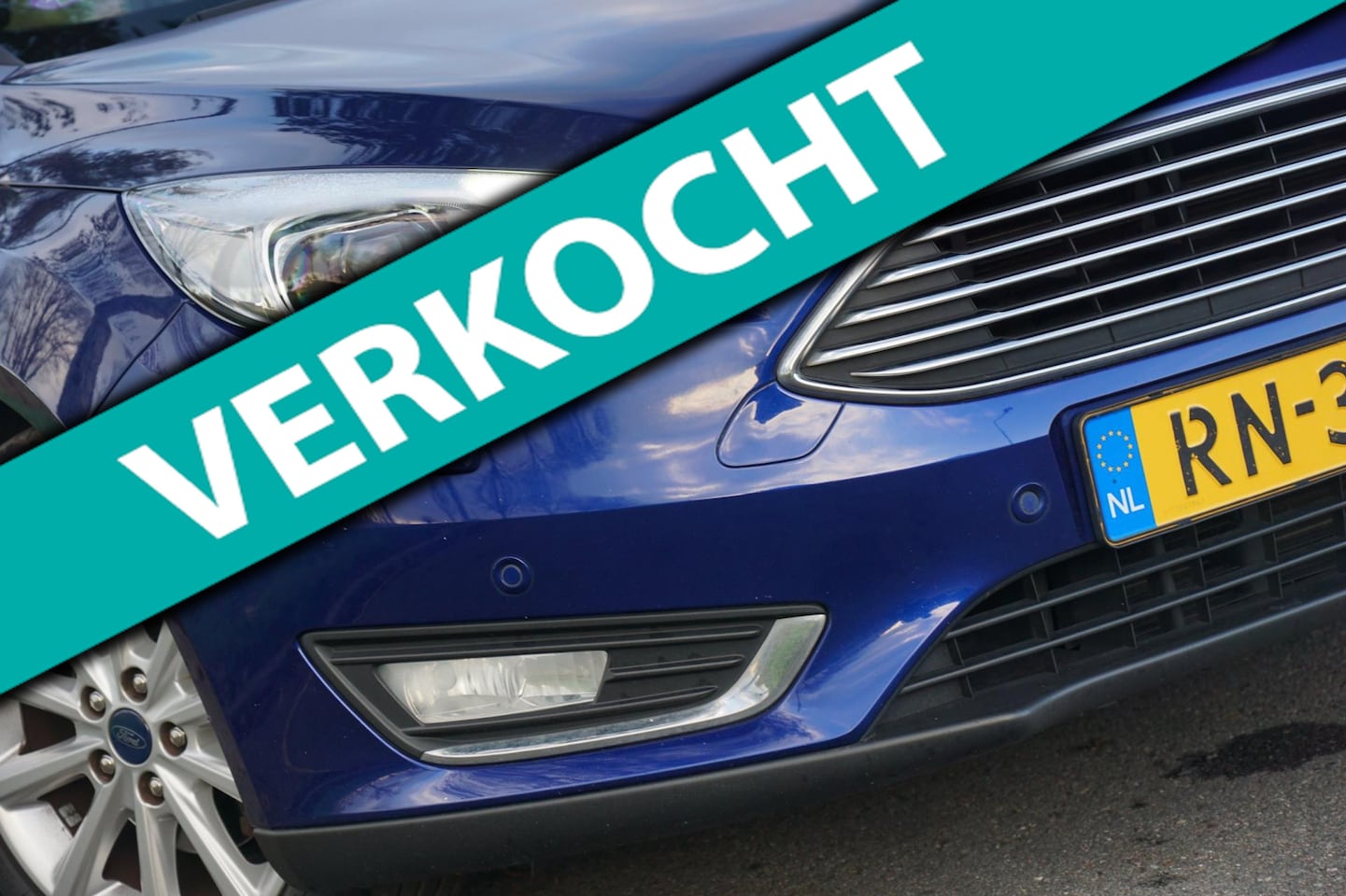 Ford Focus Wagon - 1.0 Titanium - Deep Impact Blue - Xenon/Winterpakket/Carplay - AutoWereld.nl