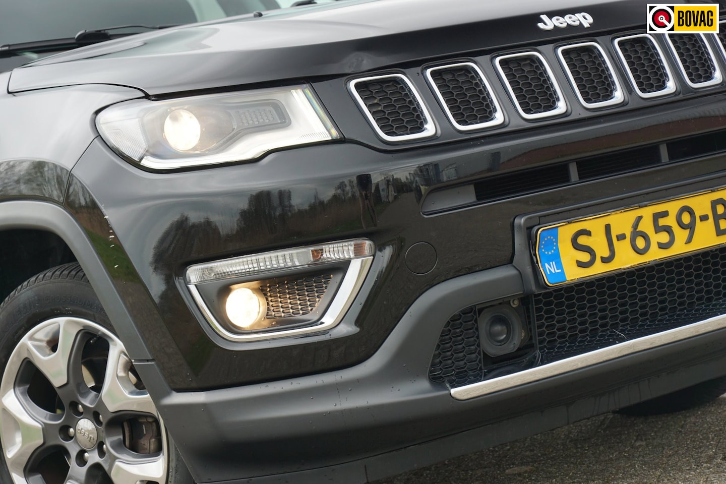 Jeep Compass - 1.4 MultiAir Opening Edition 4x4 Automaat - Diamond Black - 65dkm - AutoWereld.nl