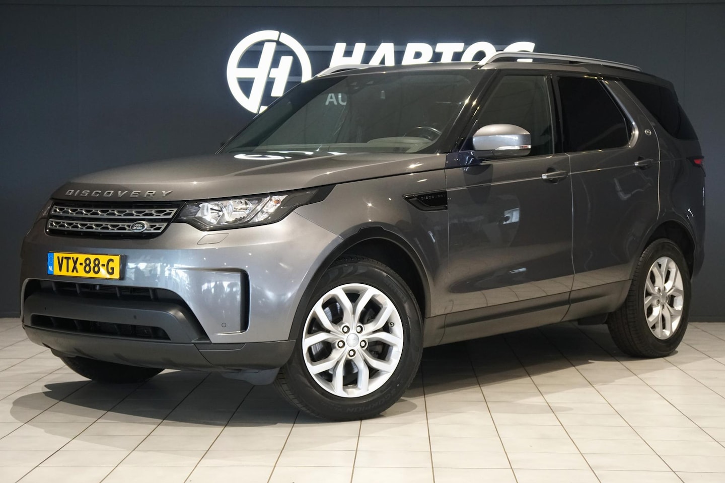 Land Rover Discovery - 2.0 Sd4 / GRIJS KENTEKEN / TREKHAAK / CAMERA / STOELVERWARMING - AutoWereld.nl